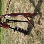 Rhino post hole digger